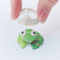 Image 2 of Frog on lily pad with ghost mask ceramic figurine 