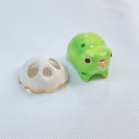 Image 1 of chubby frog with ghost mask ceramic figurine