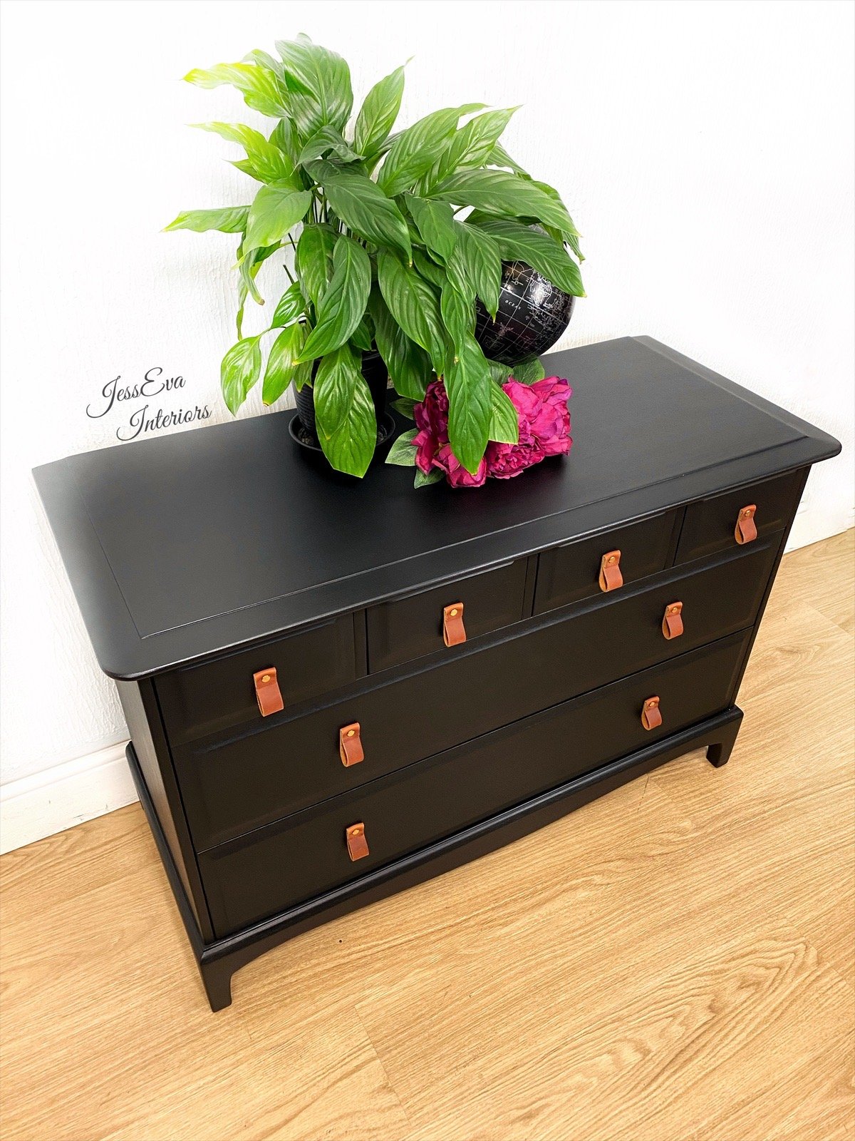 Stag Minstrel Chest Of Drawers painted in black with leather handles 
