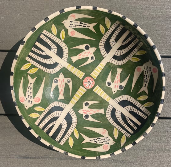Image of Dark green earthenware hand decorated bowl 