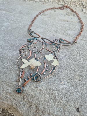 Golden fishes necklace 