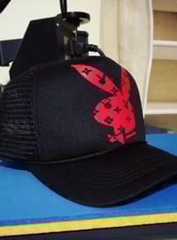 Image 1 of RED/BLACK Playboy Bunny "DIFFERENT"⚖️ Trucker Hat