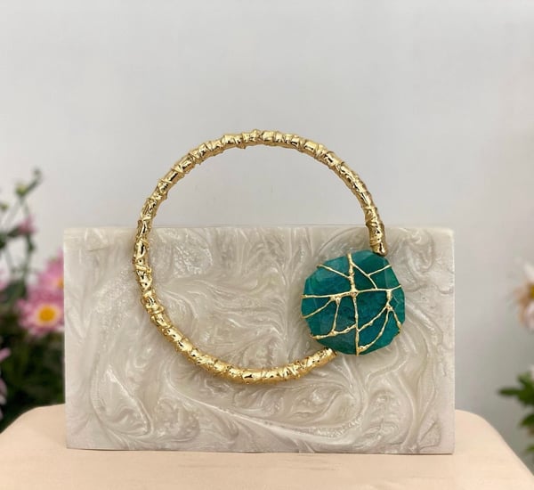 Image of Molten handle Resin clutch