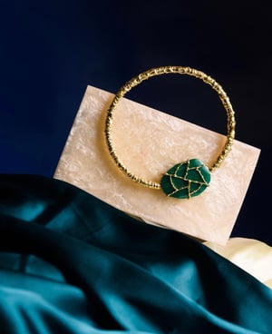 Image of Molten handle Resin clutch
