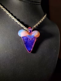 Image 2 of Opaline/purple rainbow great white shark tooth pendant.