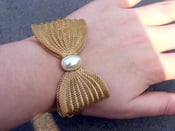 Image of Vintage gold colour bow bangle