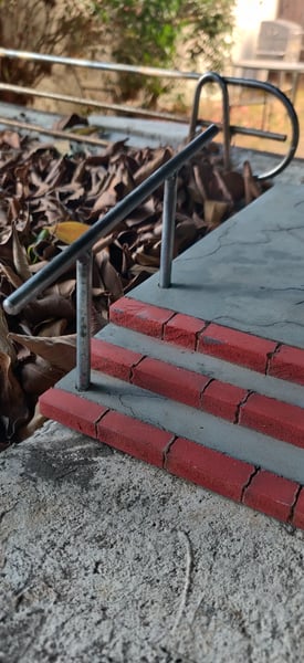 Image of Sidewalk w/ moveable  Rail