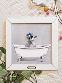 Sheep in the Bathtub with Blue Flowers