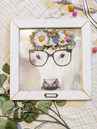 Portrait of a Cow with Glasses with Orchid Flower Crown