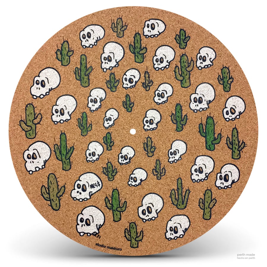 Image of Skulls and cactus (co-) Meg$ (WA)