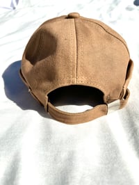 Image of inside out brimless cap in wheat 