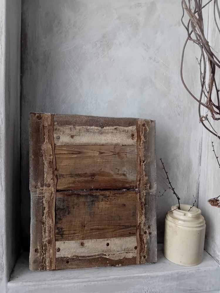 Image of Distressed Primitive Painted Flower Canvas on Antique Pine Boards