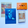 PRE-ORDER – Volta – Cassette (orange) + A6 postcards