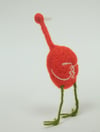 Tall orange wool quirky bird sculpture