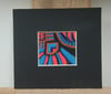 Tiny mounted painting with blue, red and black