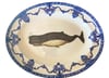 Whale platter with blue floral border.