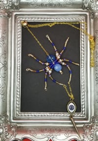 Image of Blue Spider Necklace with Evil Eye/Spike/Skull