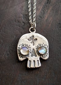 Image 1 of To Earth We Return skull pendant 
