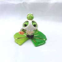 Image 2 of Zombie frog on lily pad with skull mask and pumpkin lantern ceramic figurine