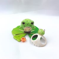 Image 4 of Zombie frog on lily pad with skull mask and pumpkin lantern ceramic figurine