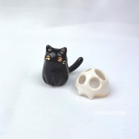 Image 1 of Black kitty with cat skull mask ceramic figurine