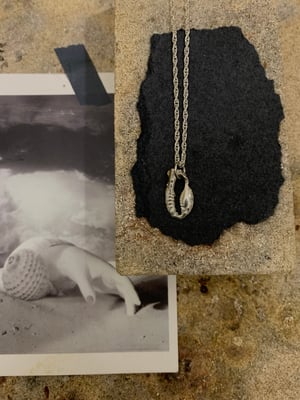 Image of "An opening" hand cast pewter pendant