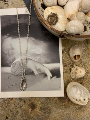 Image of "An opening" hand cast pewter pendant