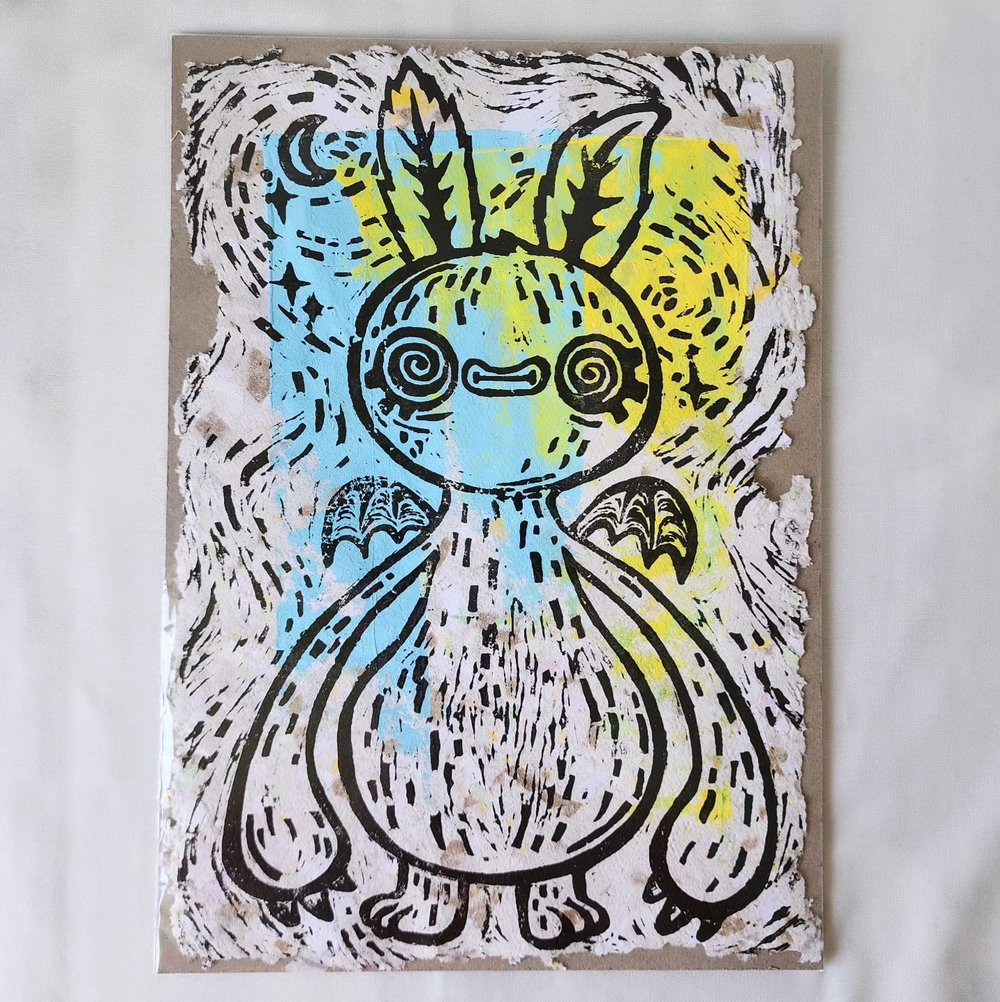 Image of Handmade moffman linoprint