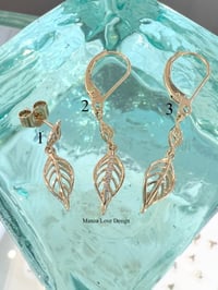 Image 1 of 14k solid gold leaf earrings 
