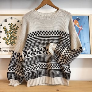 Maglione con pattern geometrico 