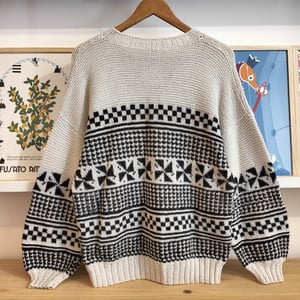 Maglione con pattern geometrico 