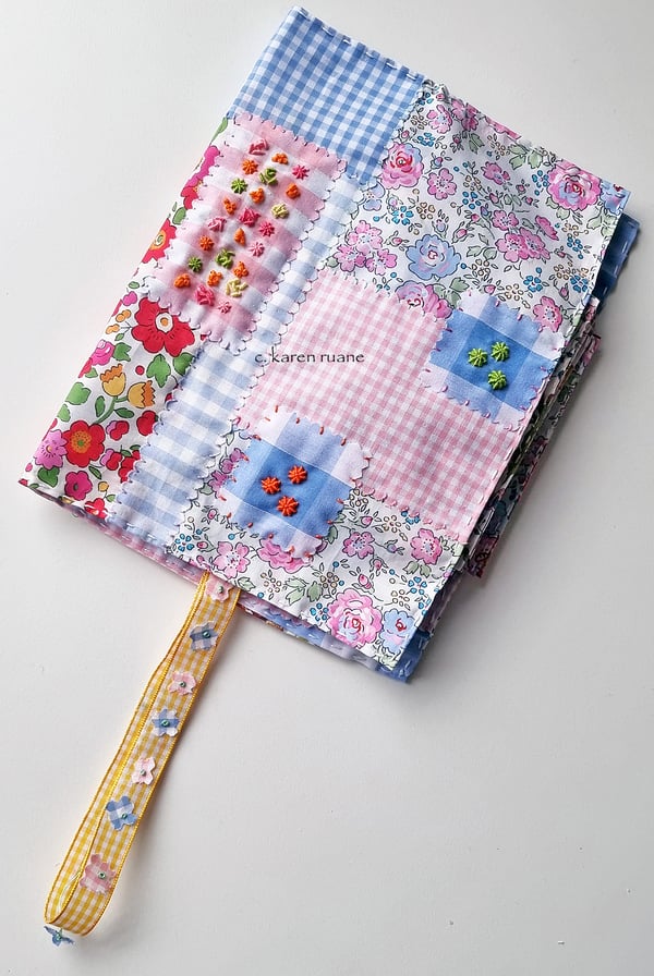 Image of Hand embroidered gingham sample book