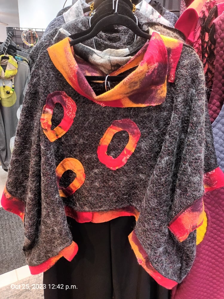 Image of grey and red sweater