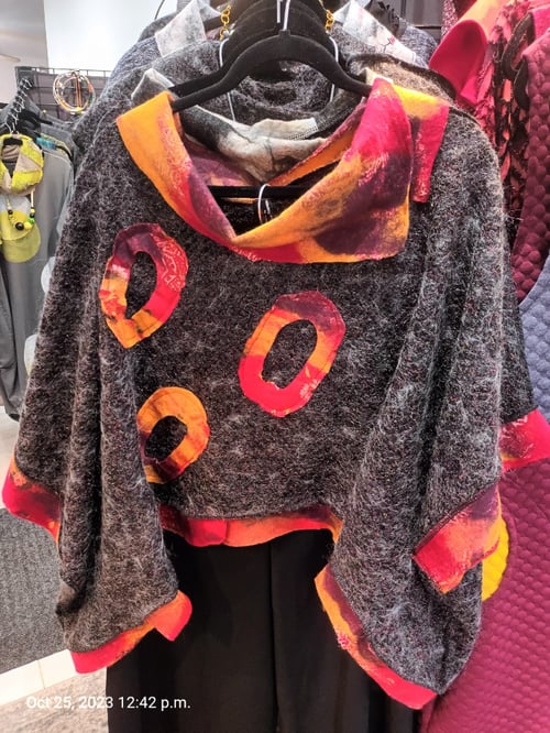 Image of grey and red sweater