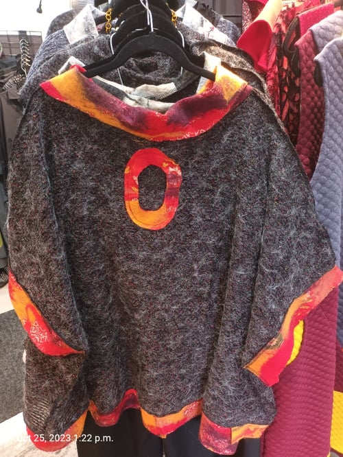 Image of grey and red sweater