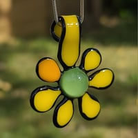 Image 1 of Flower pendant with border 