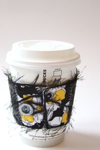 Image of Cup Cozy - Black, White, and Yellow with Flowers
