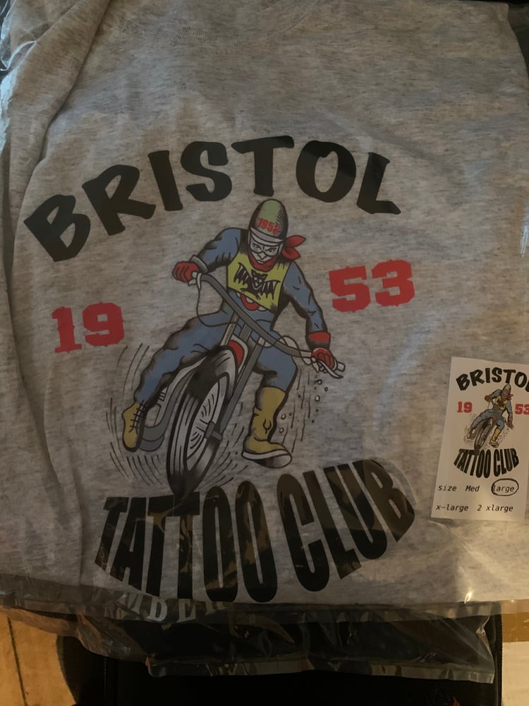Image of Bristol tattoo club speedway rider feeding 