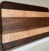 Image 1 of Walnut and Curly Maple cutting board - ready to ship!