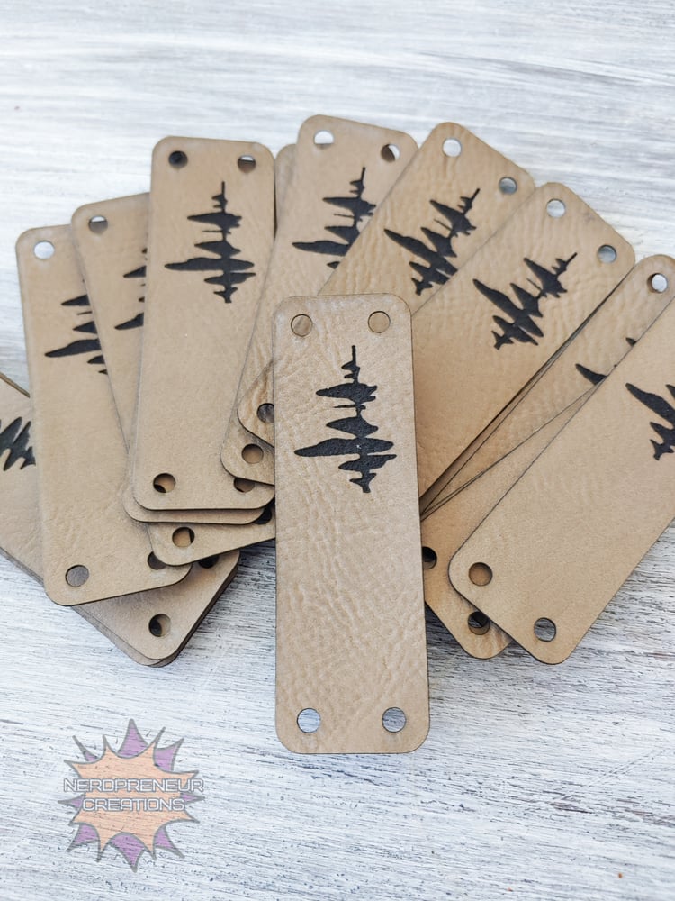 Image of BULK 2.75x0.85 Sew On Custom Logo Faux Leather Tags