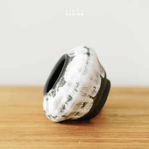 Image of Black with white texture flower pot