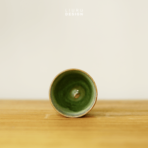 Image of Yellowish green teacup