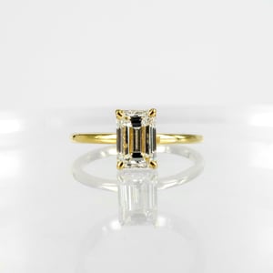 Image of 18ct yellow gold emerald cut diamond solitaire ring. SH1311