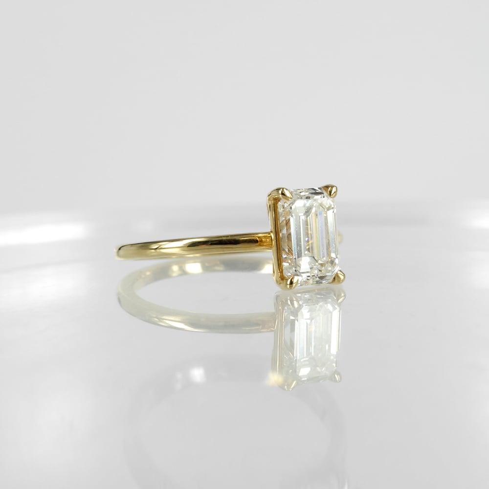 Image of 18ct yellow gold emerald cut diamond solitaire ring. SH1311