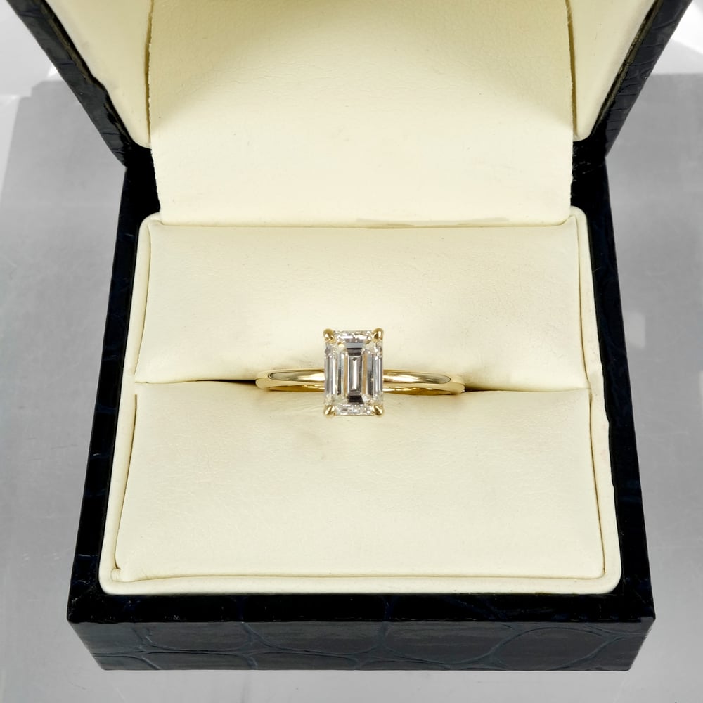 Image of 18ct yellow gold emerald cut diamond solitaire ring. SH1311