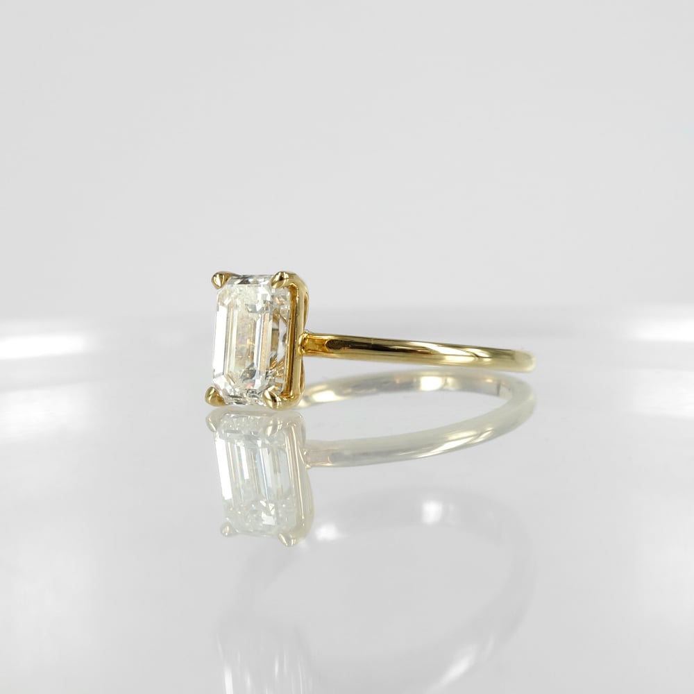 Image of 18ct yellow gold emerald cut diamond solitaire ring. SH1311