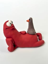 Image 1 of Bird on a Red thing