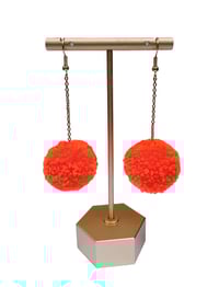 Image 4 of Outrageous Orange pom pom earrings