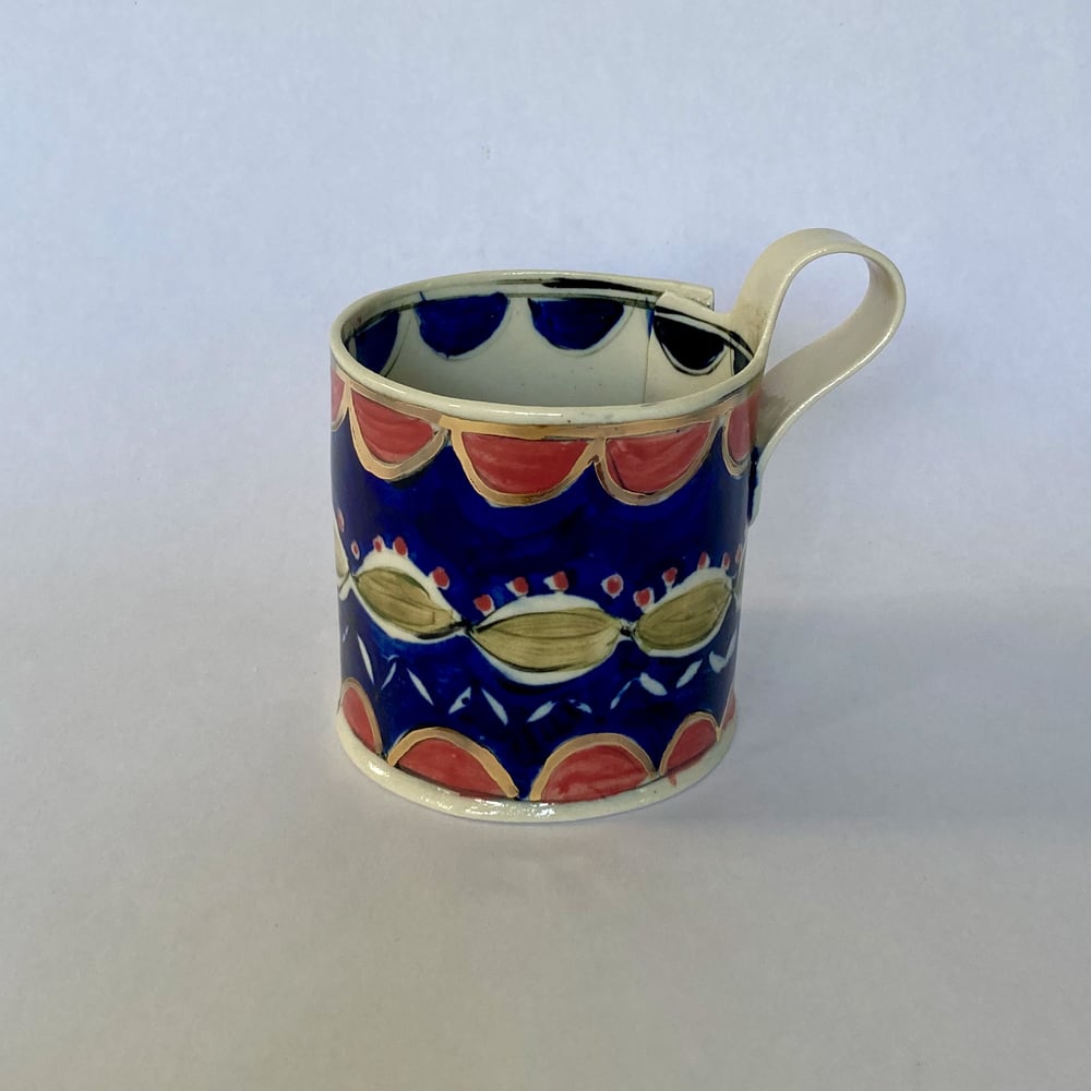 Image of Deep blue pink and gold tea cups