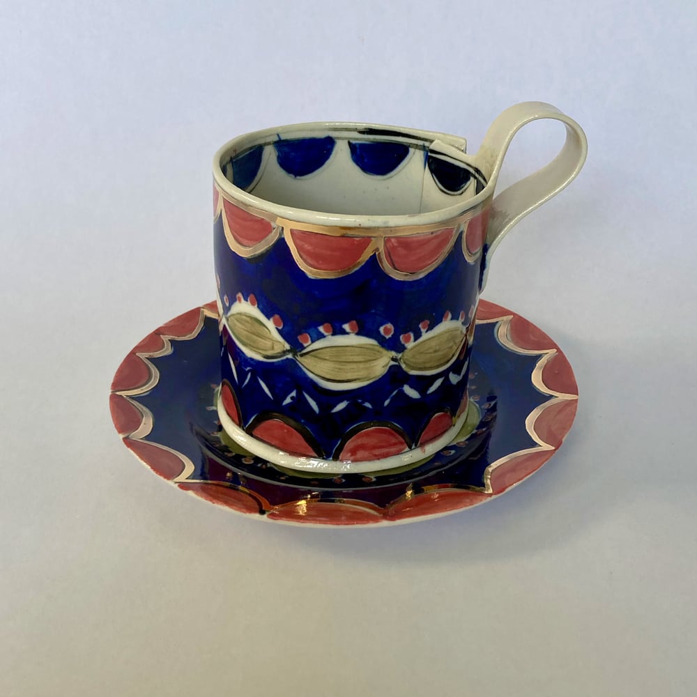 Image of Deep blue pink and gold tea cups